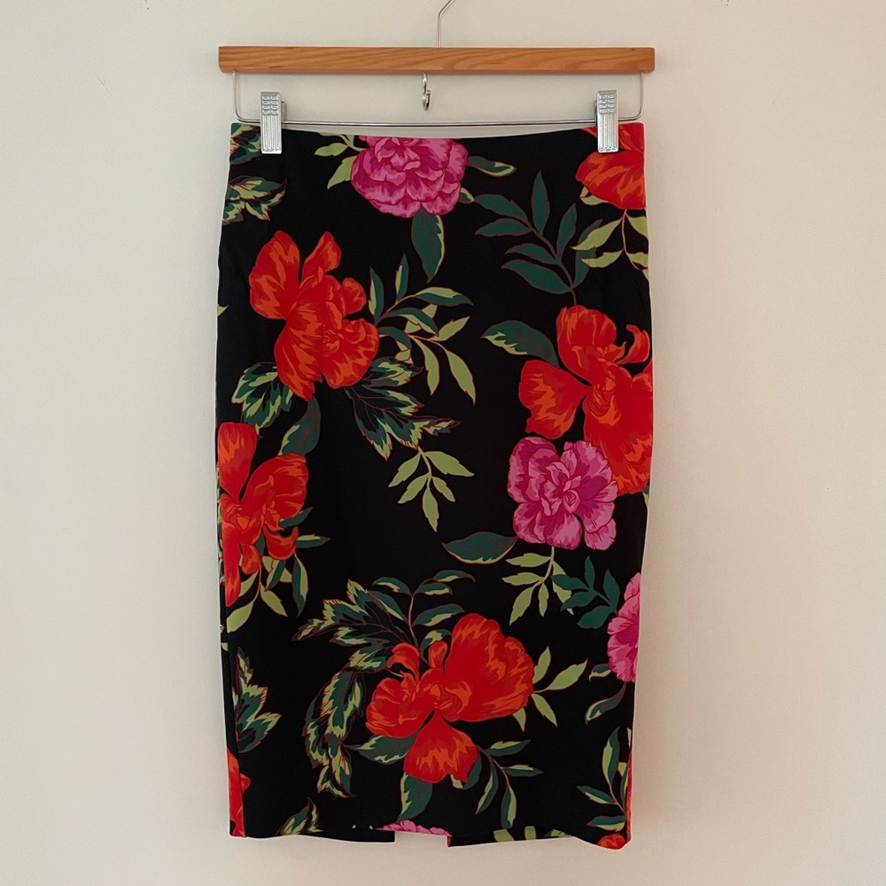 EXPRESS black floral midi skirt. Size 4. Like new. Slit in back.